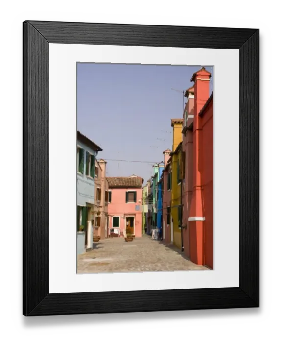 Framed Print : Italy, Venice, Burano. A typical street lined with colorful houses and laundry on the line Framed Print : Italy, Venice, Burano. A typical street lined with colorful houses and laundry on the line