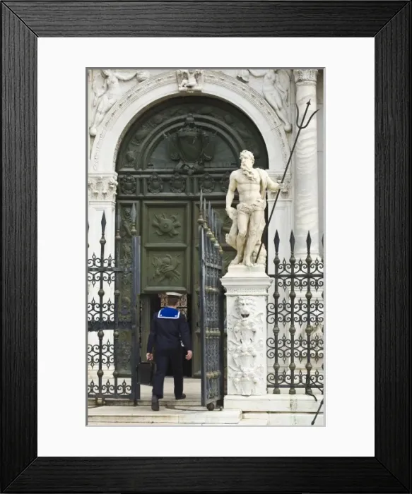 Framed Print : Italy, Venice. Sailor entering naval base Framed Print : Italy, Venice. Sailor entering naval base