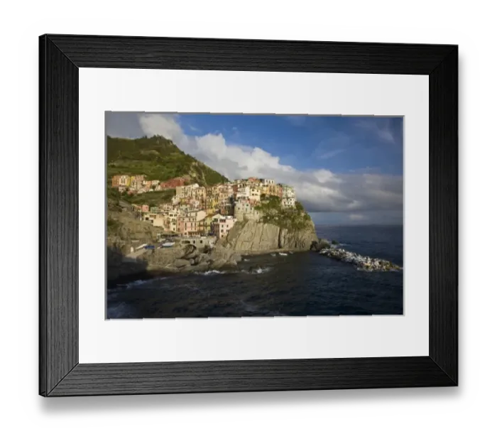 Framed Print : Italy, Cinque Terre, Manarola. Village on cliff in afternoon light Framed Print : Italy, Cinque Terre, Manarola. Village on cliff in afternoon light