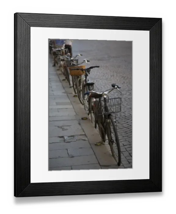 Framed Print : Bicycles parked at curb, Ferrara, Emilia Romagne, Italy Framed Print : Bicycles parked at curb, Ferrara, Emilia Romagne, Italy