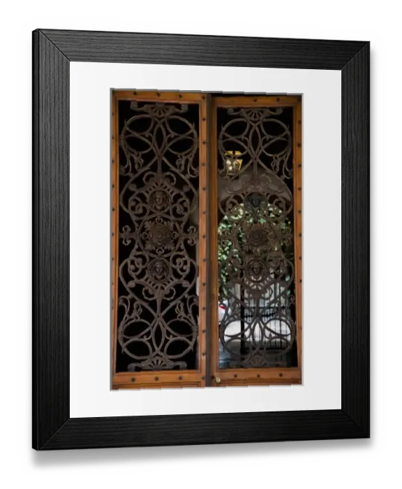 Framed Print : Bologna, Emilia-Romagna, Italy - A gage can be seen behind double wooden doors with