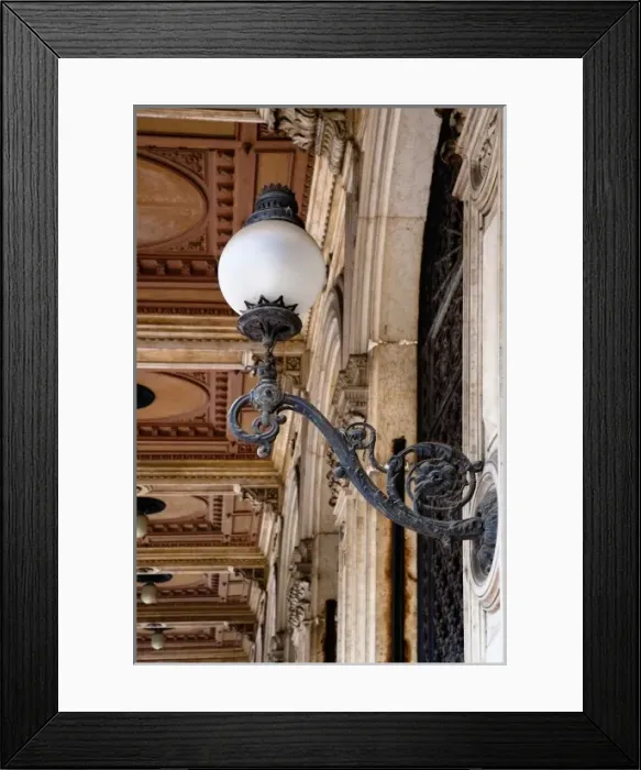 Framed Print : Bologna, Emilia-Romagna, Italy - An ornate lamp is mounted on a building wall. Decorative Framed Print : Bologna, Emilia-Romagna, Italy - An ornate lamp is mounted on a building wall. Decorative