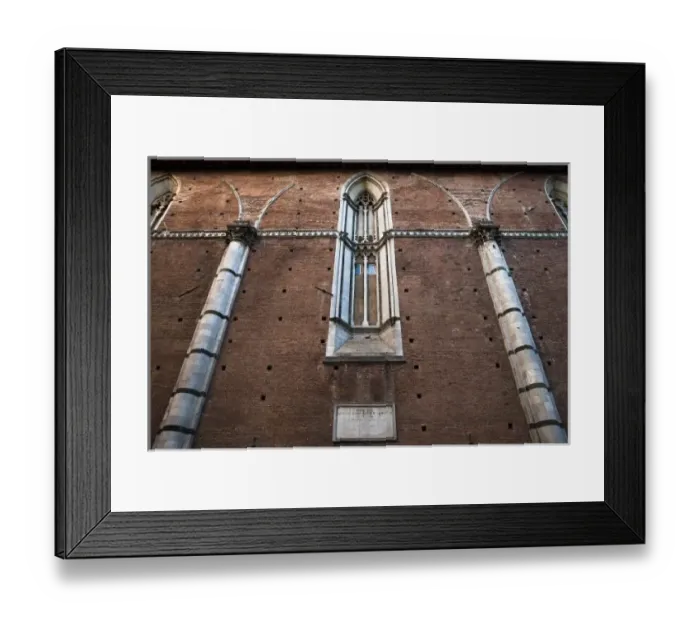Framed Print : Sienna, Tuscany, Italy - Exterior low angle view of an ancient church Framed Print : Sienna, Tuscany, Italy - Exterior low angle view of an ancient church