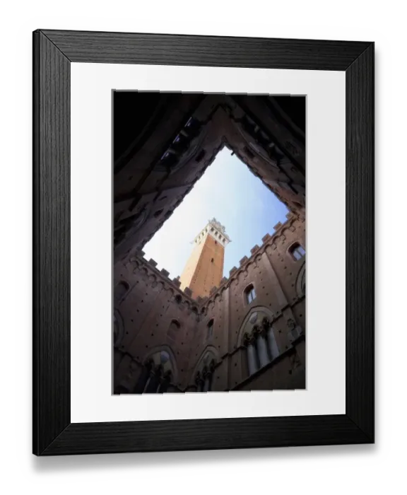 Framed Print : Sienna, Tuscany, Italy - Low angle view looking up from the enclosed courtyard of an old building Framed Print : Sienna, Tuscany, Italy - Low angle view looking up from the enclosed courtyard of an old building