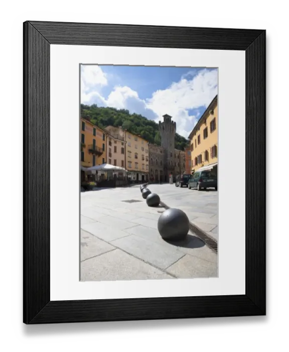 Framed Print : Tuscany, Italy - Iron balls lining the edge of a pedestrian plaza Framed Print : Tuscany, Italy - Iron balls lining the edge of a pedestrian plaza