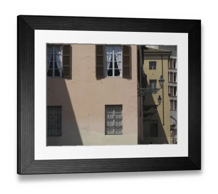 Framed Print : Battistero church in the far background and houses