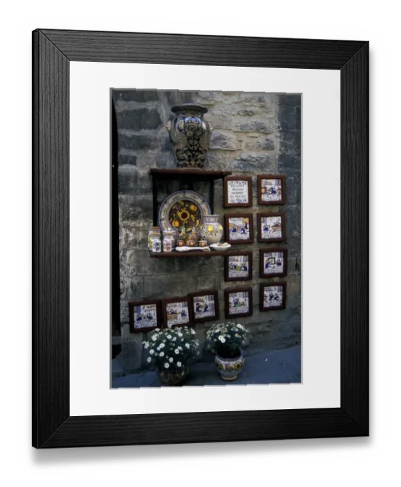 Framed Print : Europe, Italy, Umbria, Assisi. Pottery on village wall
