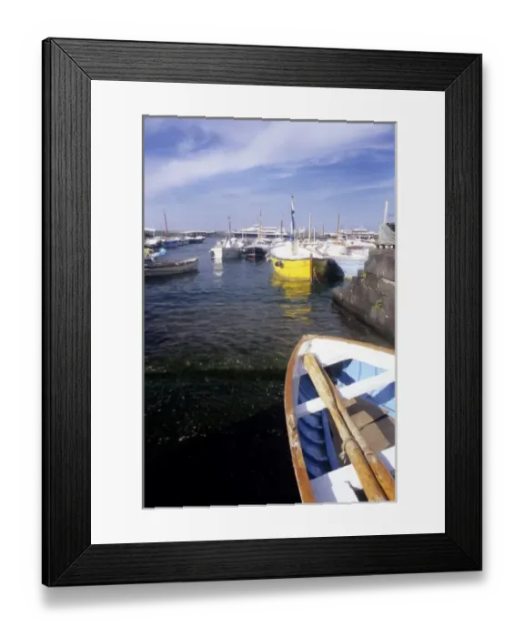 Framed Print : A fishing boat on the Isle of Capri in Capritown, Italy Framed Print : A fishing boat on the Isle of Capri in Capritown, Italy