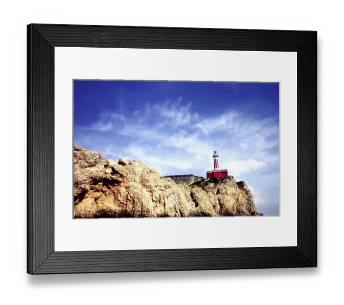 Framed Print : The Punta Carena lighthouse looks out on the Bay of Naples from the Isle of Capri Framed Print : The Punta Carena lighthouse looks out on the Bay of Naples from the Isle of Capri