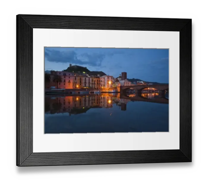 Framed Print : Italy, Sardinia, Bosa. Evening along Temo Riverfront and Ponte Vecchio bridge