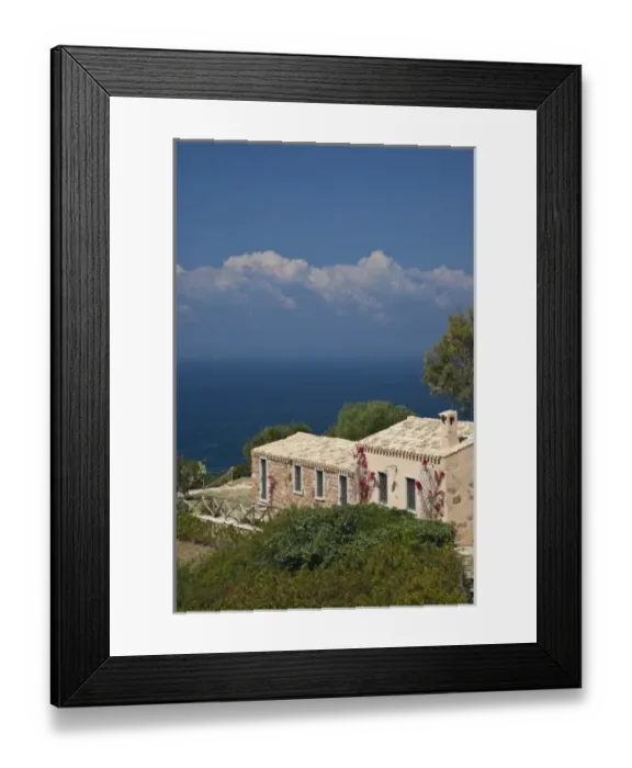 Framed Print : Italy, Sardinia, Capoterra. Cliffside house