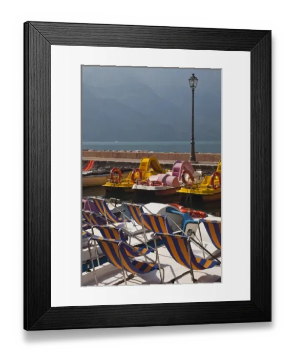 Framed Print : Italy, Trento Province, Riva del Garda. Lakefront paddleboats