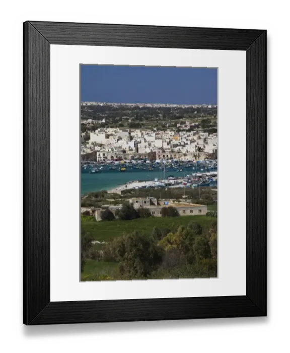 Framed Print : Malta, Southeast, Marsaxlokk, village view from Delimara Point Framed Print : Malta, Southeast, Marsaxlokk, village view from Delimara Point