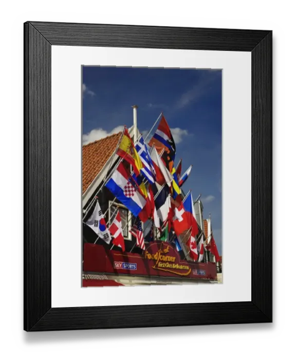 Framed Print : Flags on building, Volendam, Netherlands, Holland Framed Print : Flags on building, Volendam, Netherlands, Holland