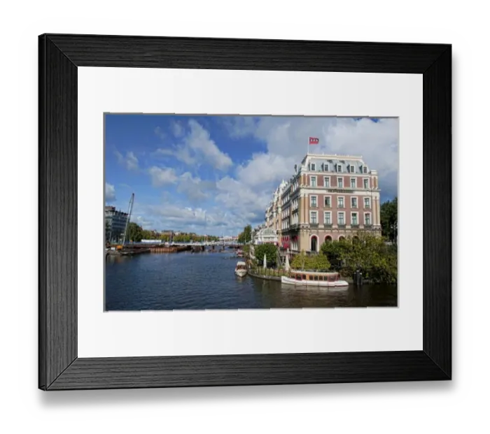Framed Print : Local working boats on the canals in Amsterdam, the Netherlands Framed Print : Local working boats on the canals in Amsterdam, the Netherlands