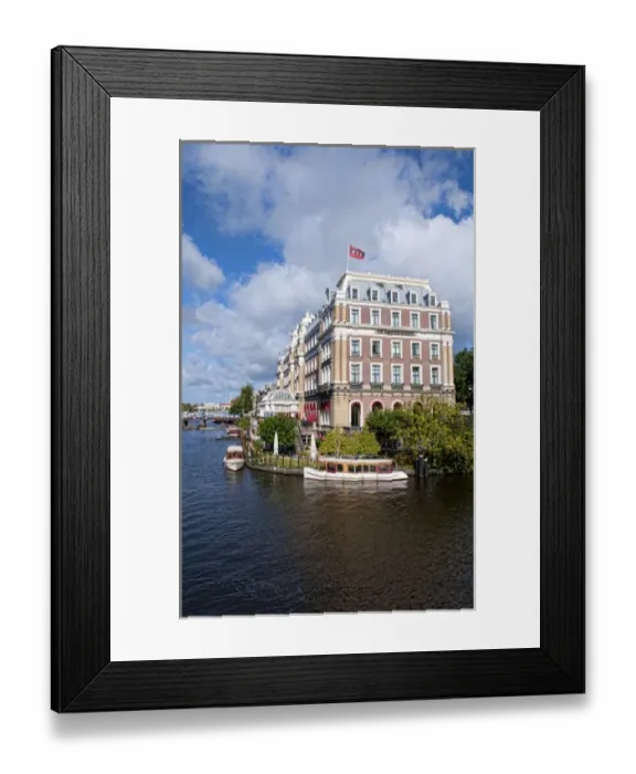 Framed Print : Local working boats on the canals in Amsterdam, the Netherlands Framed Print : Local working boats on the canals in Amsterdam, the Netherlands
