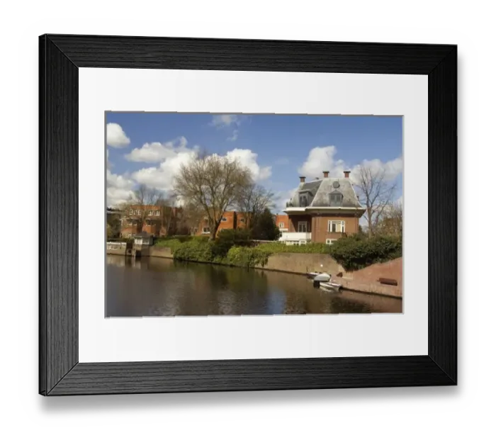 Framed Print : Europe, The Netherlands (aka Holland), Amsterdam. Everyday life along the neighborhood
