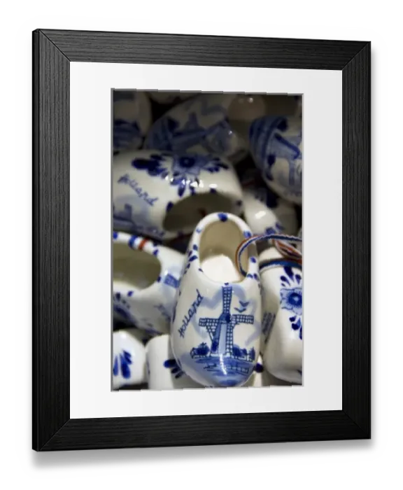 Framed Print : Europe, The Netherlands (aka Holland), Amsterdam. Souvenir blue Delft wooden shoes Framed Print : Europe, The Netherlands (aka Holland), Amsterdam. Souvenir blue Delft wooden shoes
