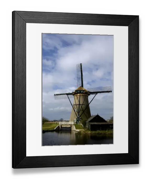 Framed Print : Netherlands (aka Holland), Kinderdijk. 19 historic windmills situated at the convergence Framed Print : Netherlands (aka Holland), Kinderdijk. 19 historic windmills situated at the convergence