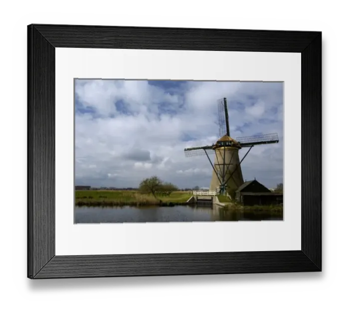 Framed Print : Netherlands (aka Holland), Kinderdijk. 19 historic windmills situated at the convergence Framed Print : Netherlands (aka Holland), Kinderdijk. 19 historic windmills situated at the convergence