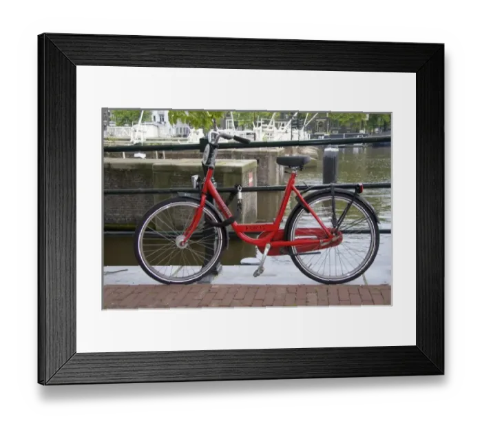 Framed Print : Rental bicycle parked along the Amstel River in Amsterdam, Netherlands Framed Print : Rental bicycle parked along the Amstel River in Amsterdam, Netherlands