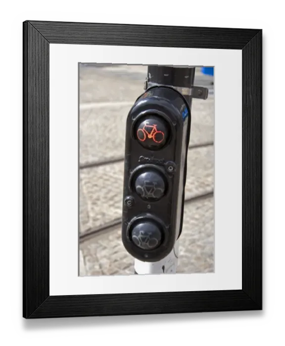 Framed Print : A traffic light showing when it is safe for bicycles to cross the street in Amsterdam, Netherlands Framed Print : A traffic light showing when it is safe for bicycles to cross the street in Amsterdam, Netherlands