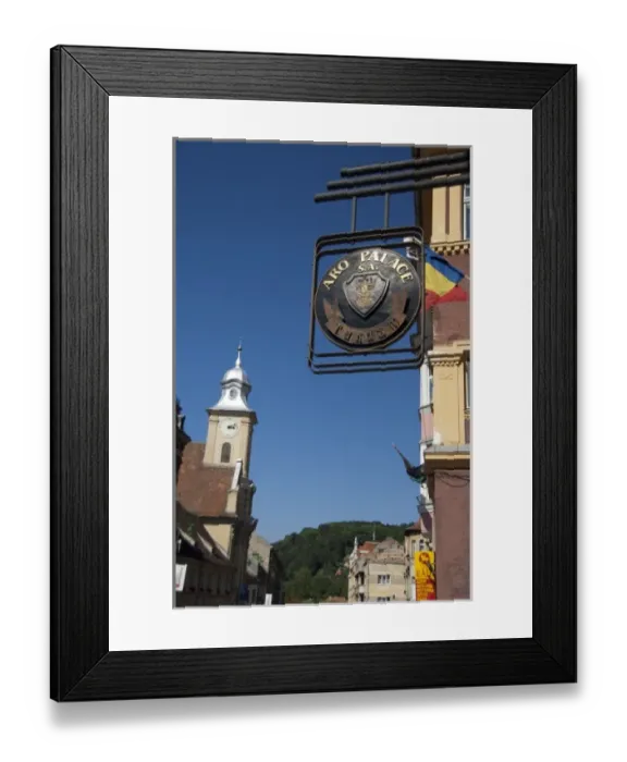 Framed Print : Romania, Transylvania, Brasov. Typical downtown street secen in Historic District Framed Print : Romania, Transylvania, Brasov. Typical downtown street secen in Historic District