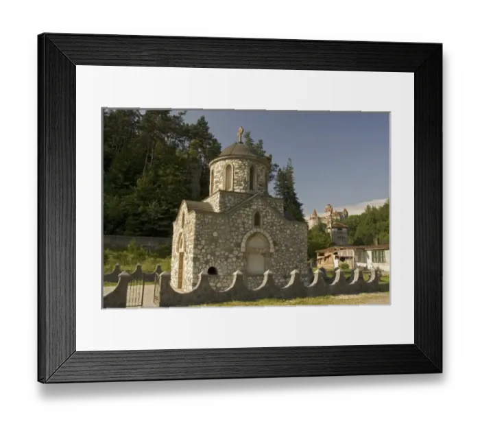 Framed Print : Romania, Brasov, Bran, The old church below the Bran Castle and Bran Castle in