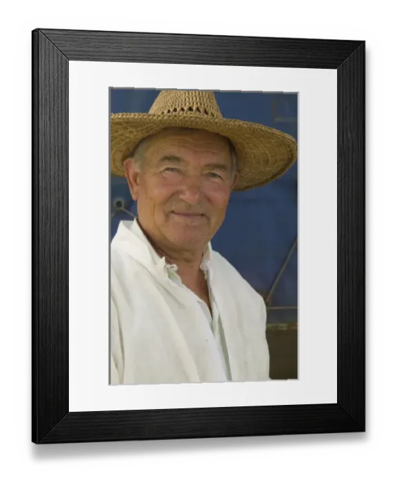 Framed Print : Bee keeper man in hat, Romania, Danube Delta MR