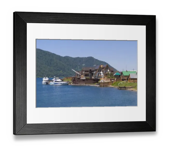 Framed Print : Baikal Legend Hotel with boats at Listvyanka in Lake Baikal near Irkutsk in Siberia