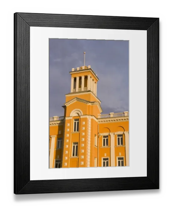 Framed Print : Colorful yellow building in downtown in Irkutsk in Siberia, Russia Framed Print : Colorful yellow building in downtown in Irkutsk in Siberia, Russia