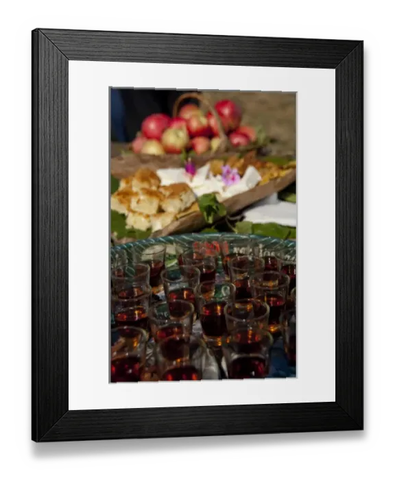 Framed Print : Serbia, Donji Milanovac. Traditional Serbian snack of plum brandy (aka honey brandy or Rakija)