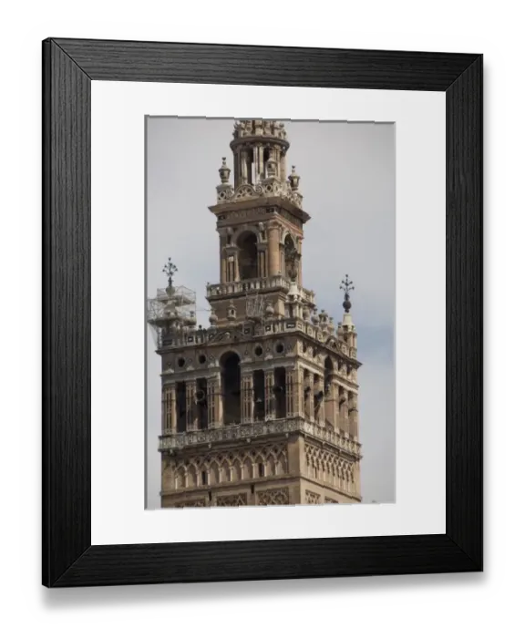 Framed Print : Spain, Seville. Gothic Seville Cathedral. Detail of La Giralda Renaissance bell tower