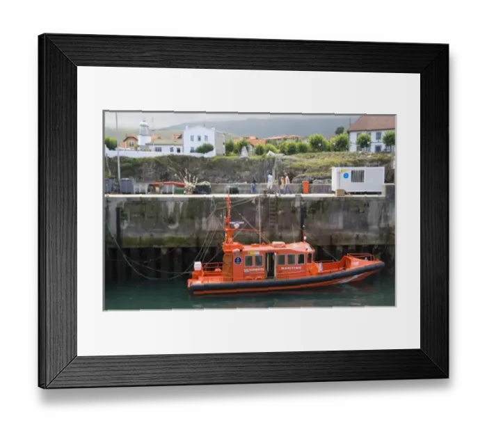 Framed Print : Maritime rescue vessel in the harbor at Llanes, Spain Framed Print : Maritime rescue vessel in the harbor at Llanes, Spain