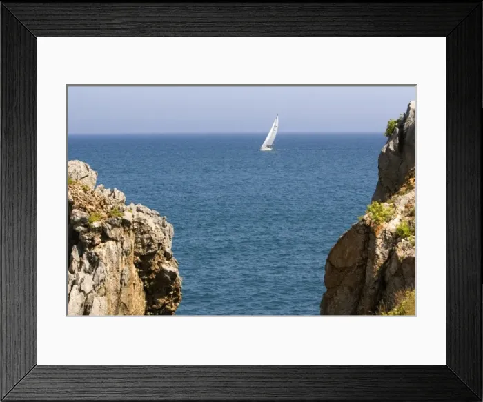 Framed Print : Sailboat entering the harbor at Castro Urdiales, Cantabria, northern Spain Framed Print : Sailboat entering the harbor at Castro Urdiales, Cantabria, northern Spain