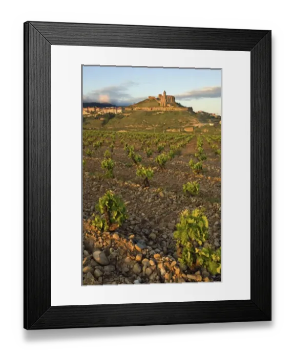 Framed Print : Sunset on San Vicente de la Sonsierra village perched on a hill top overlooking vineyards Framed Print : Sunset on San Vicente de la Sonsierra village perched on a hill top overlooking vineyards