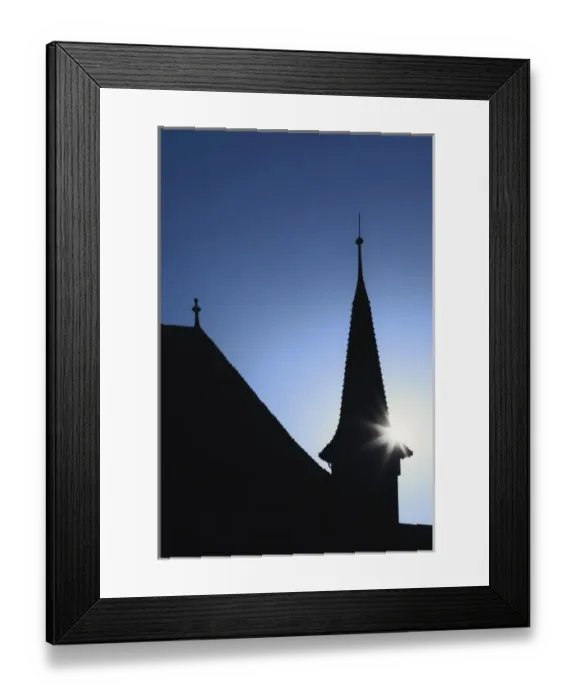 Framed Print : Sun behind church steeple, Zurich, Switzerland