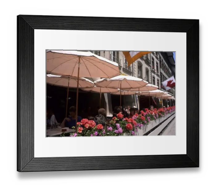 Framed Print : Life in Switzerland colorful flowers and cafe in beautiful city of Bern Switzerland Framed Print : Life in Switzerland colorful flowers and cafe in beautiful city of Bern Switzerland