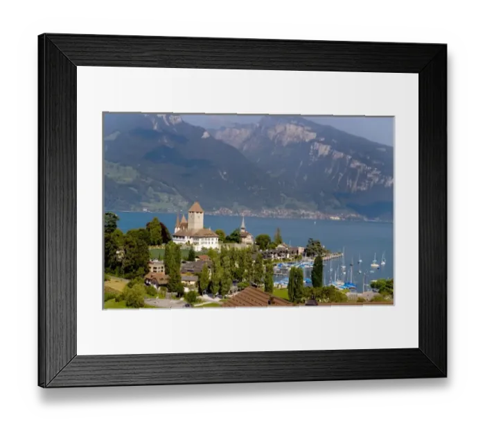 Framed Print : Beautiful village of Spiez on Lake Thun in Swiss Alps near Interlaken with church steeple Framed Print : Beautiful village of Spiez on Lake Thun in Swiss Alps near Interlaken with church steeple
