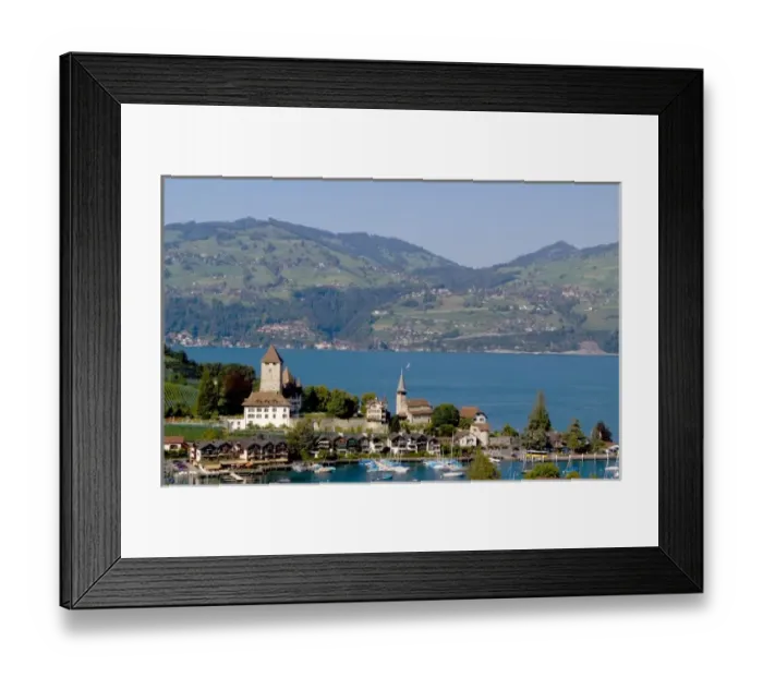 Framed Print : Beautiful village of Spiez on Lake Thun in Swiss Alps near Interlaken with church steeple Framed Print : Beautiful village of Spiez on Lake Thun in Swiss Alps near Interlaken with church steeple
