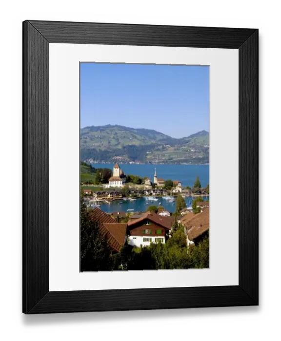 Framed Print : Beautiful village of Spiez on Lake Thun in Swiss Alps near Interlaken with church steeple Framed Print : Beautiful village of Spiez on Lake Thun in Swiss Alps near Interlaken with church steeple