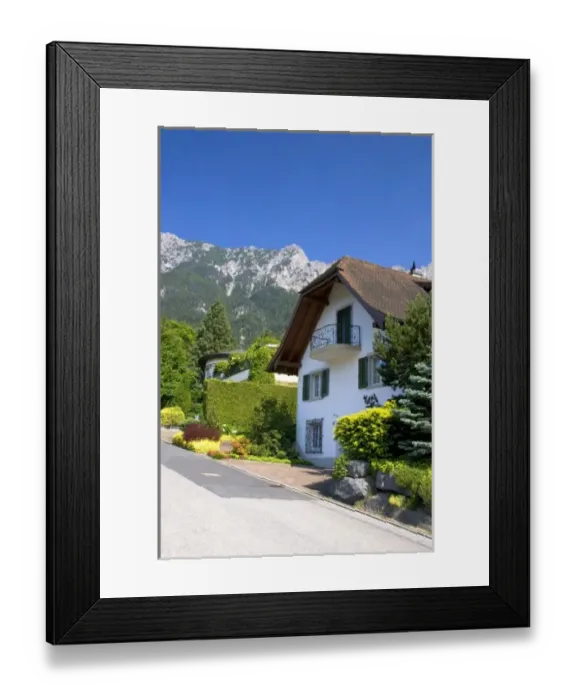 Framed Print : Housing in Lichtenstein with the Swiss Alps in the background Framed Print : Housing in Lichtenstein with the Swiss Alps in the background