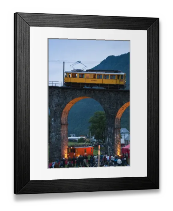 Framed Print : Brusio, Switzerland. Historic rail cars and trains on the circular railway viaduct in Brusio