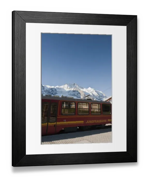 Framed Print : Jungfrau Region, Switzerland. Jungfrau massif and Jungfraujoch train in Kleine Scheidegg