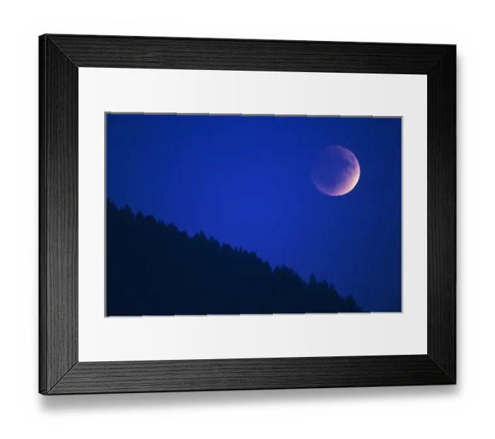 Framed Print : Lunar Eclipse over forest, Zug, Switzerland Framed Print : Lunar Eclipse over forest, Zug, Switzerland