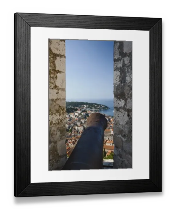 Framed Print : Cannon from Hvar Castle overlooking Hvar, and the Adriatic Sea, Hvar Island, Croatia Framed Print : Cannon from Hvar Castle overlooking Hvar, and the Adriatic Sea, Hvar Island, Croatia