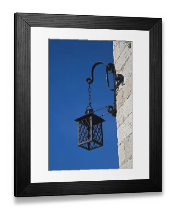 Framed Print : Lamp hanging at corner of building, Hvar Island, Croatia Framed Print : Lamp hanging at corner of building, Hvar Island, Croatia