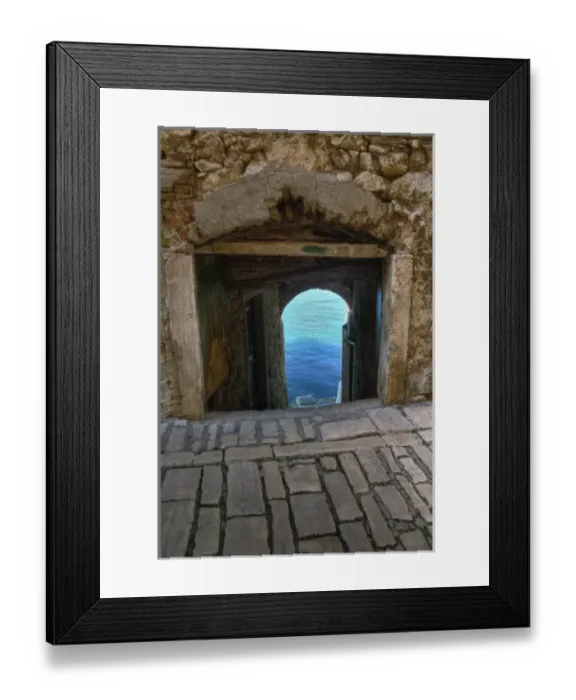 Framed Print : Arched walkway framing view of Adriatic Sea, Rovigno, Croatia Framed Print : Arched walkway framing view of Adriatic Sea, Rovigno, Croatia