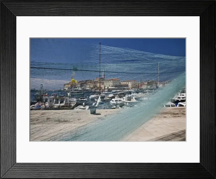 Framed Print : Fishing nets and harbor in front of distant Cathedral of St. Euphemia, Rovigno, Croatia Framed Print : Fishing nets and harbor in front of distant Cathedral of St. Euphemia, Rovigno, Croatia