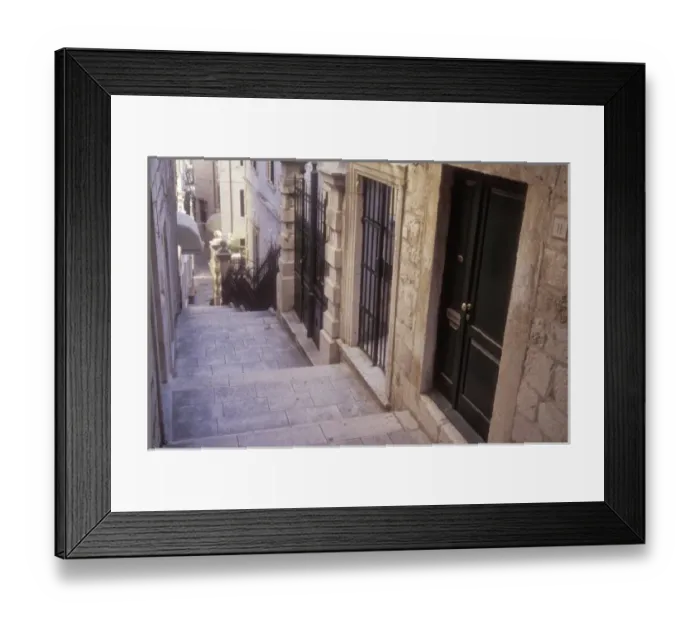 Framed Print : Doors to many homes line the narrow street in a residential area of Old Town Dubrovnik